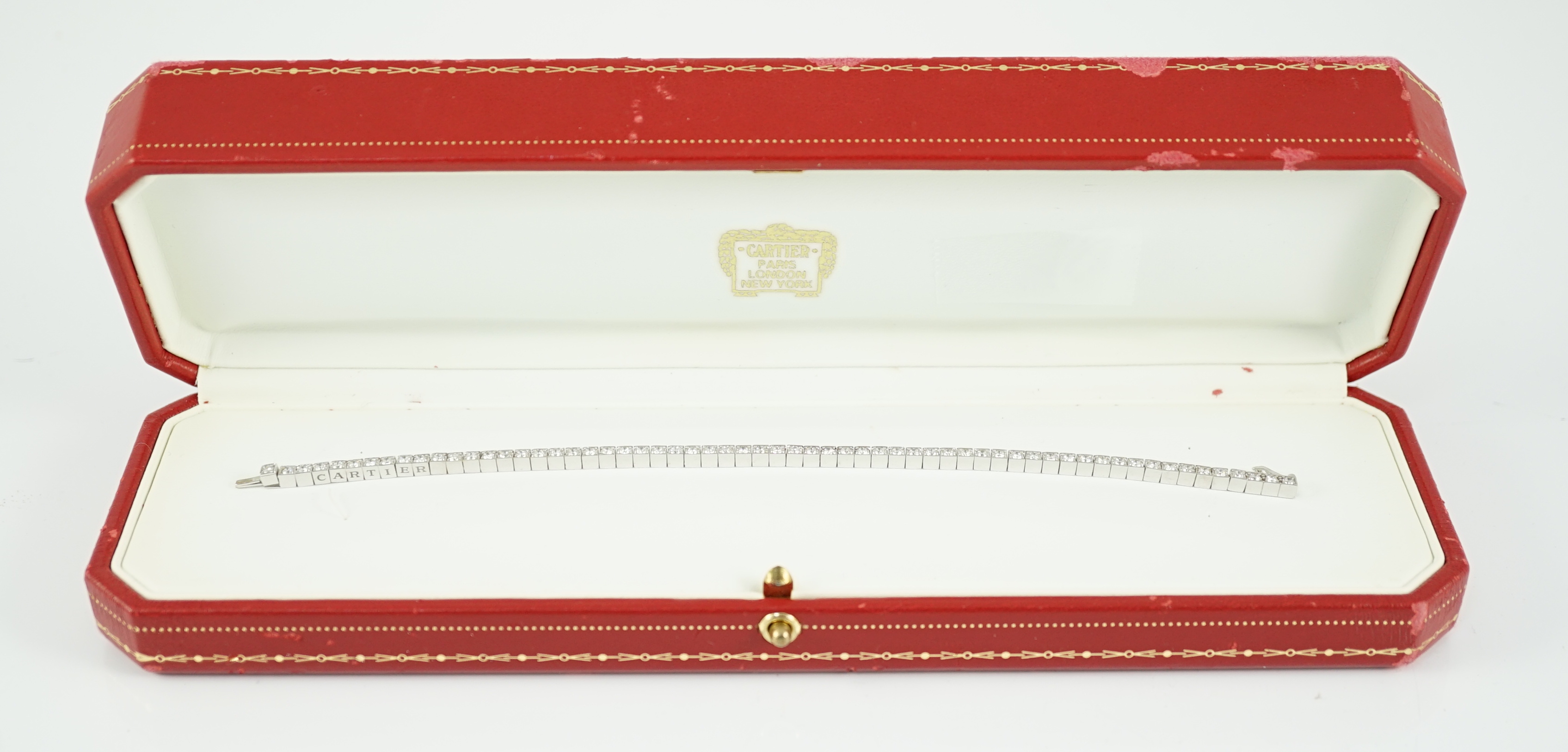 A late 20th century Cartier 18ct white gold and diamond set line bracelet